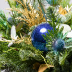 Dettaglio Capelliera nera con pino e eryngium
